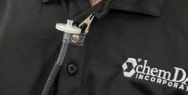 Lapel-clip breathing-zone inlet